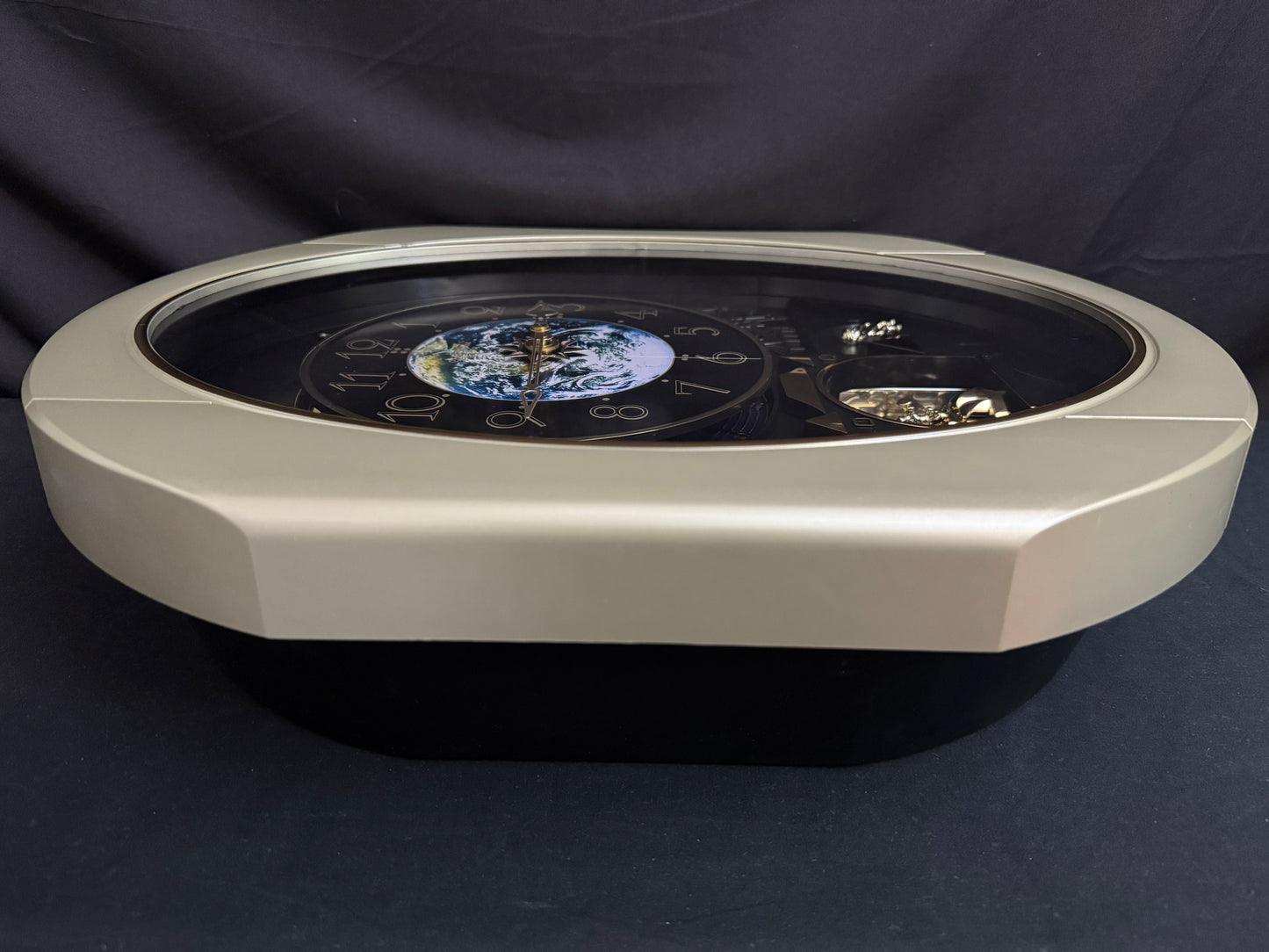 Rhythm “Peaceful Cosmos Entertainer” Moving Earth Dial Magic Motion Musical Wall Clock with Popular Melodies - 4MH839WB19