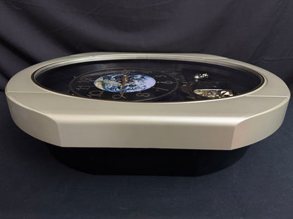 Rhythm “Peaceful Cosmos Entertainer” Moving Earth Dial Magic Motion Musical Wall Clock with Popular Melodies - 4MH839WB19