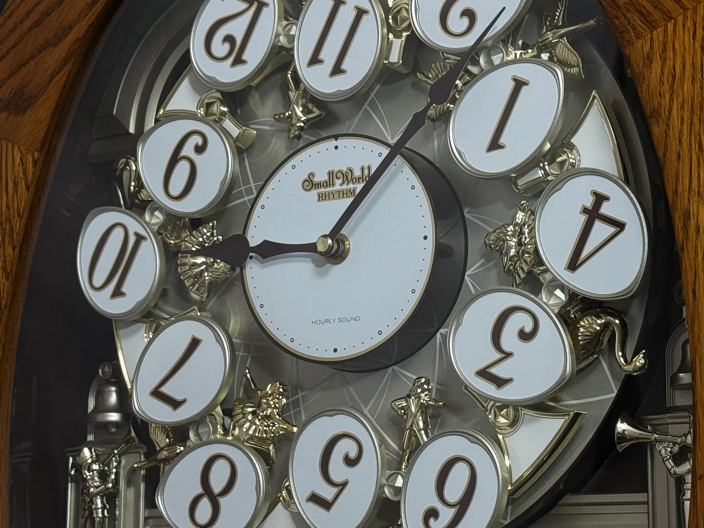 Rhythm "SSS Encore" Magic Motion Musical Wooden Wall Clock with Animated Moving Dial and Popular Melodies - 4MH810-R06