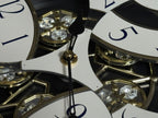 Rhythm "CTS Brilliance" Moving Dial Magic Motion Musical Wall Clock with Popular Melodies - 4MH787-R18