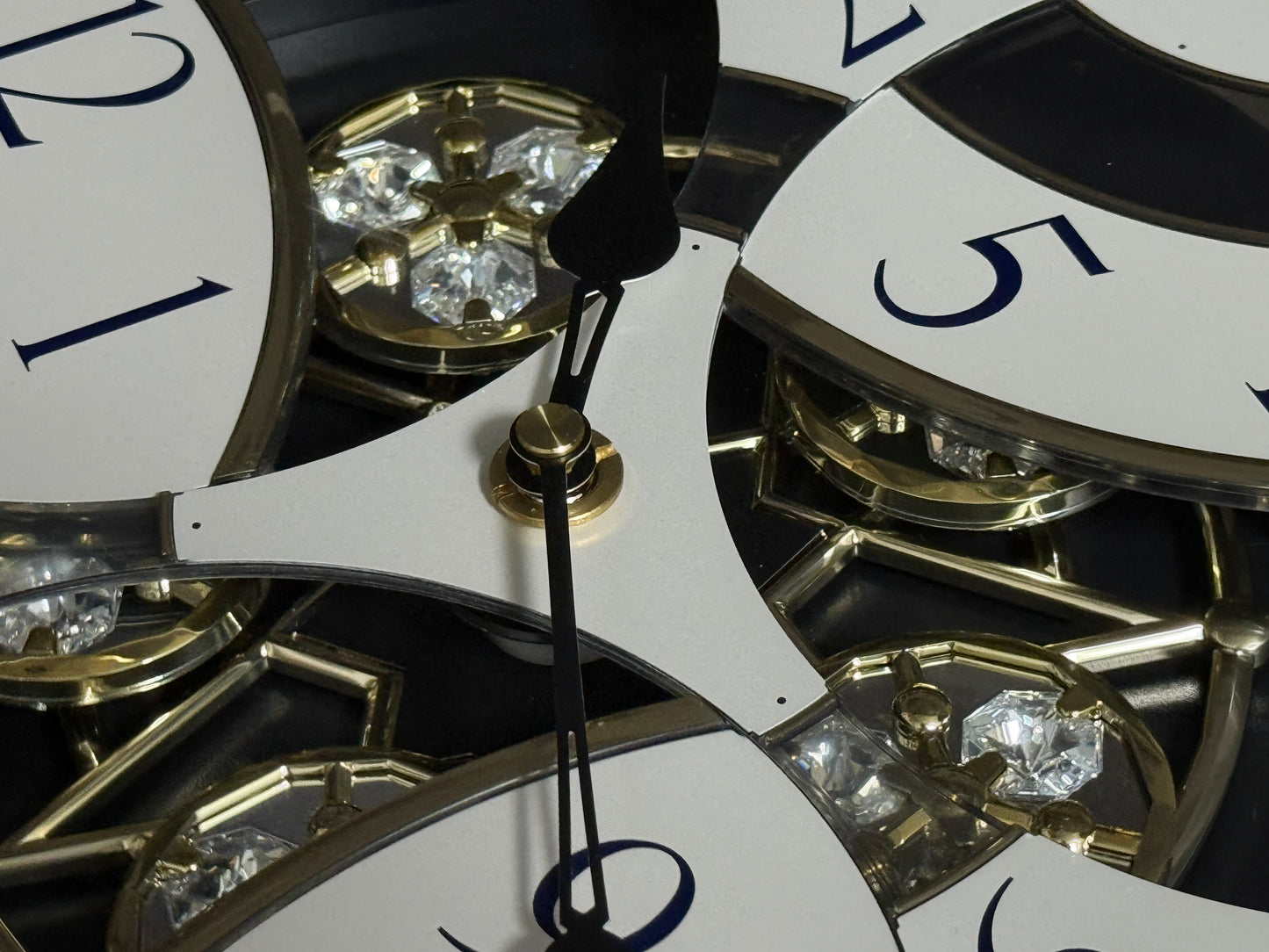 Rhythm "CTS Brilliance" Moving Dial Magic Motion Musical Wall Clock with Popular Melodies - 4MH787-R18