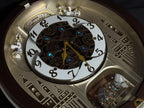 Seiko QXM491BRH "2013 Special Collector's Edition" Melodies in Motion Dancing Dial Musical Wall Clock with '70s Pop Music