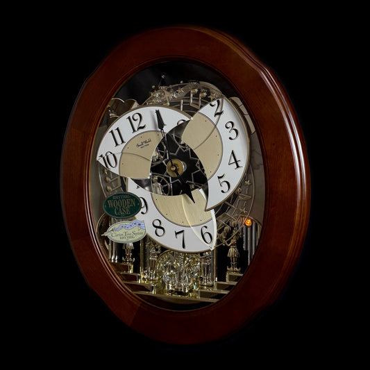 Rhythm "CTS Nostalgia" Moving Dial Magic Motion Musical Wooden Wall Clock with Popular Melodies - 4MH780-R06