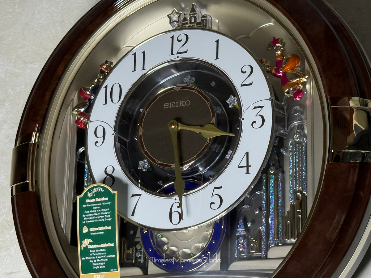 Seiko QXM333BRH "Trumpeting Angels" Melodies in Motion Jaw-Dropping Dial Musical Moving Wall Clock with 13 Songs
