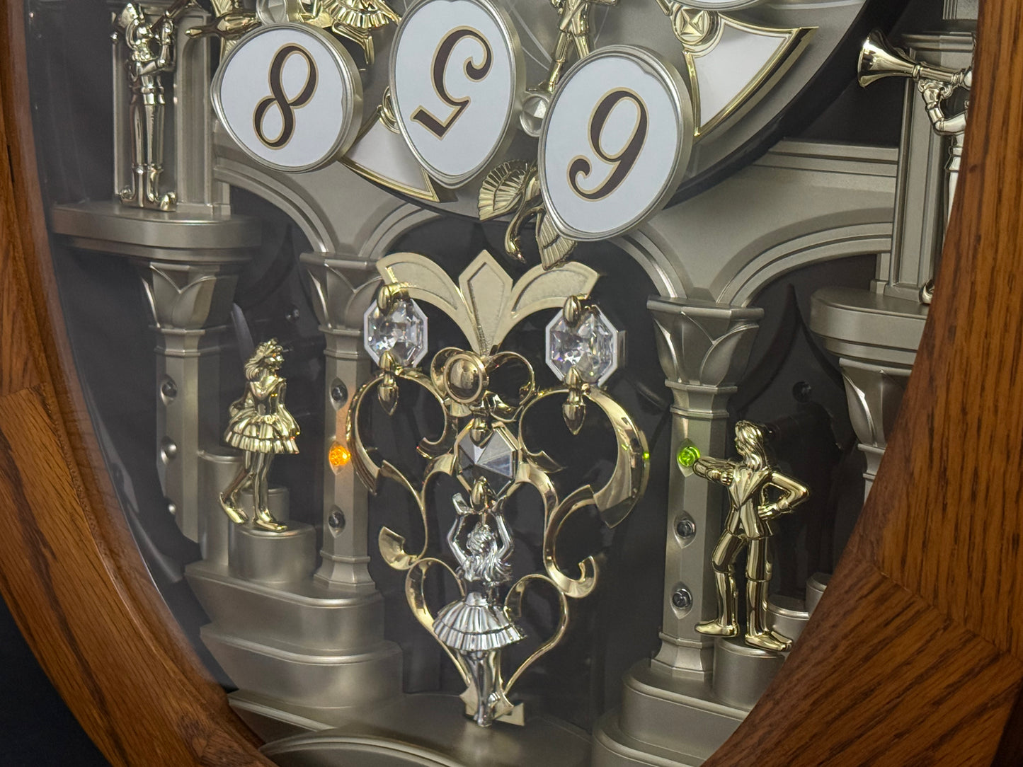 Rhythm "SSS Encore" Magic Motion Musical Wooden Wall Clock with Animated Moving Dial and Popular Melodies - 4MH810-R06