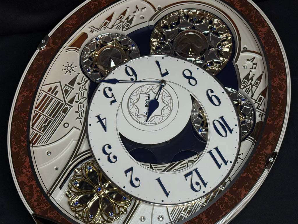 Rhythm "Gala III" Magic Motion Musical Wall Clock with Rotating Dial - 4MH447WU23