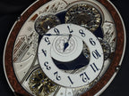 Rhythm "Gala III" Magic Motion Musical Wall Clock with Rotating Dial - 4MH447WU23