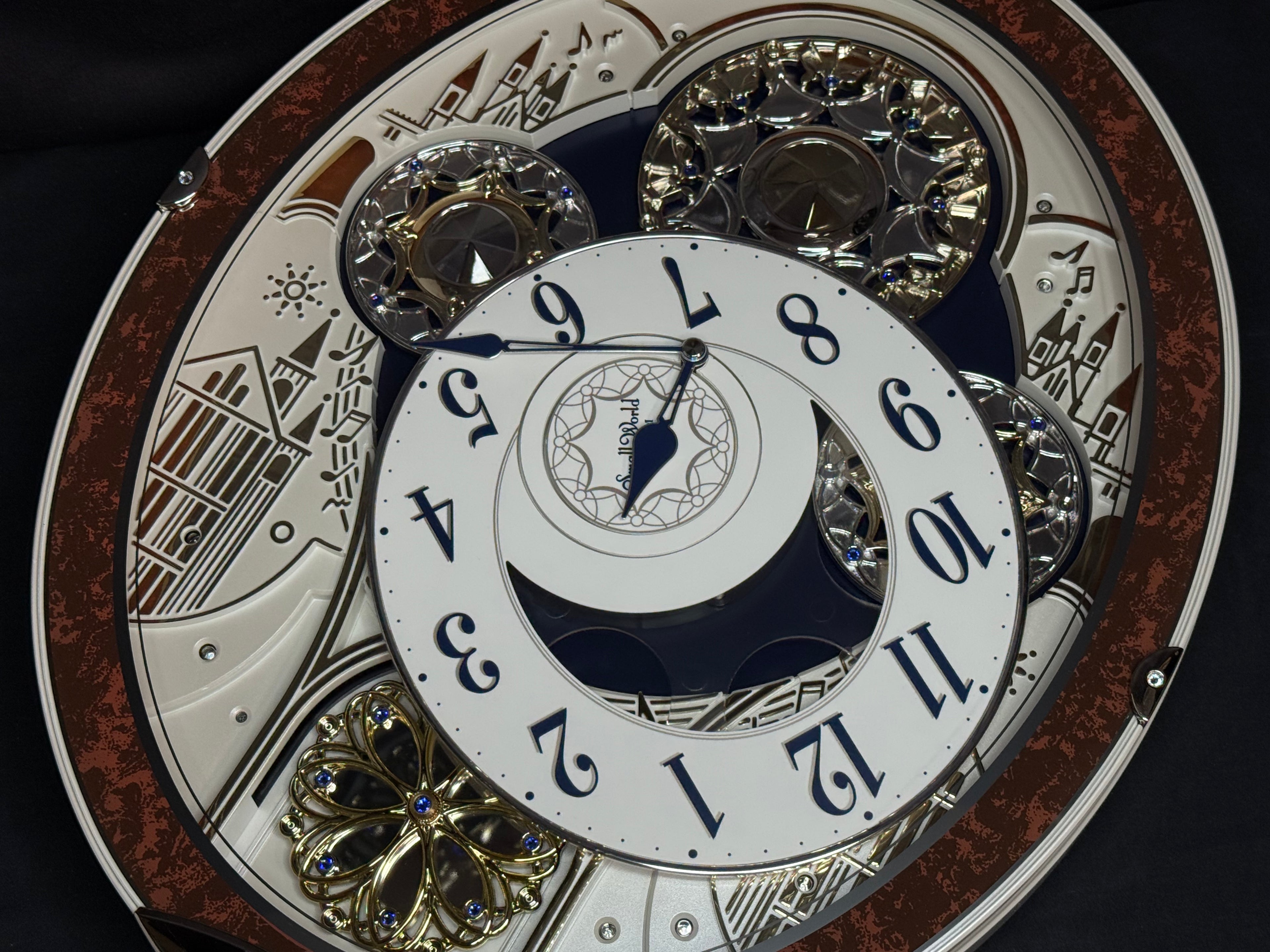 Rhythm "Gala III" Magic Motion Musical Wall Clock with Rotating Dial - 4MH447WU23