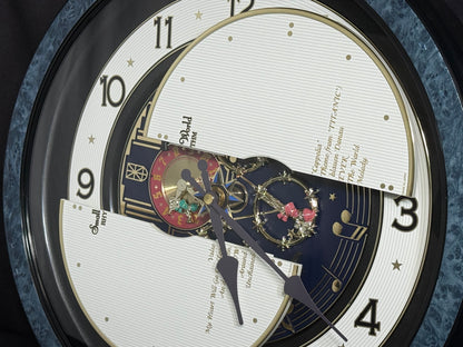 Rhythm “Small World Partage Home (Blue)” Moving Dial Magic Motion Musical Wall Clock with Popular Melodies - 4MH754RH04