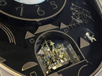 Rhythm “Peaceful Cosmos” Moving Earth Dial Magic Motion Musical Wall Clock with Popular Melodies - 4MH751AR19