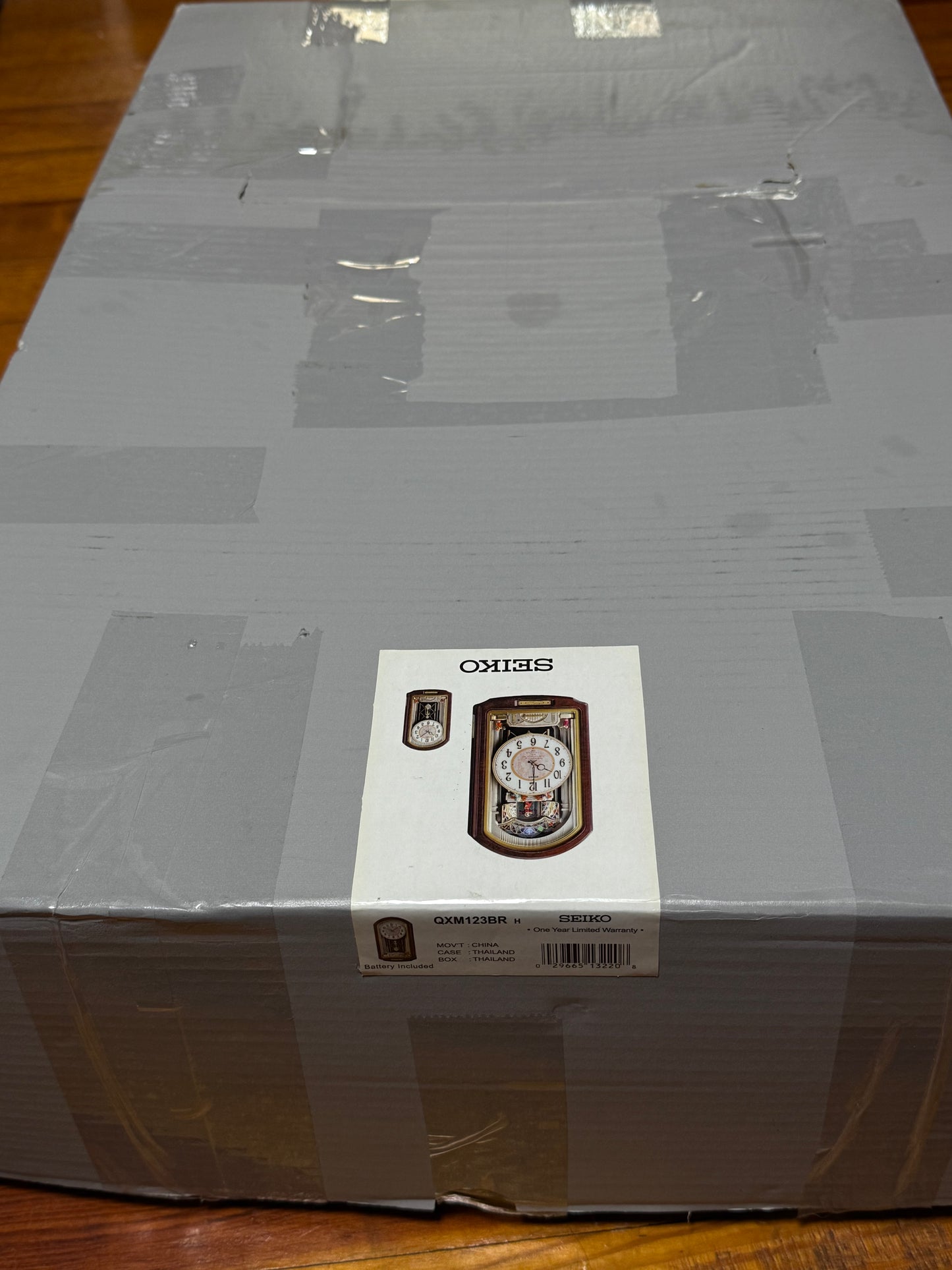 Seiko QXM123BRH "Broadway Showtunes Dropping Dial" Melodies in Motion Musical Moving Wall Clock with Popular Melodies