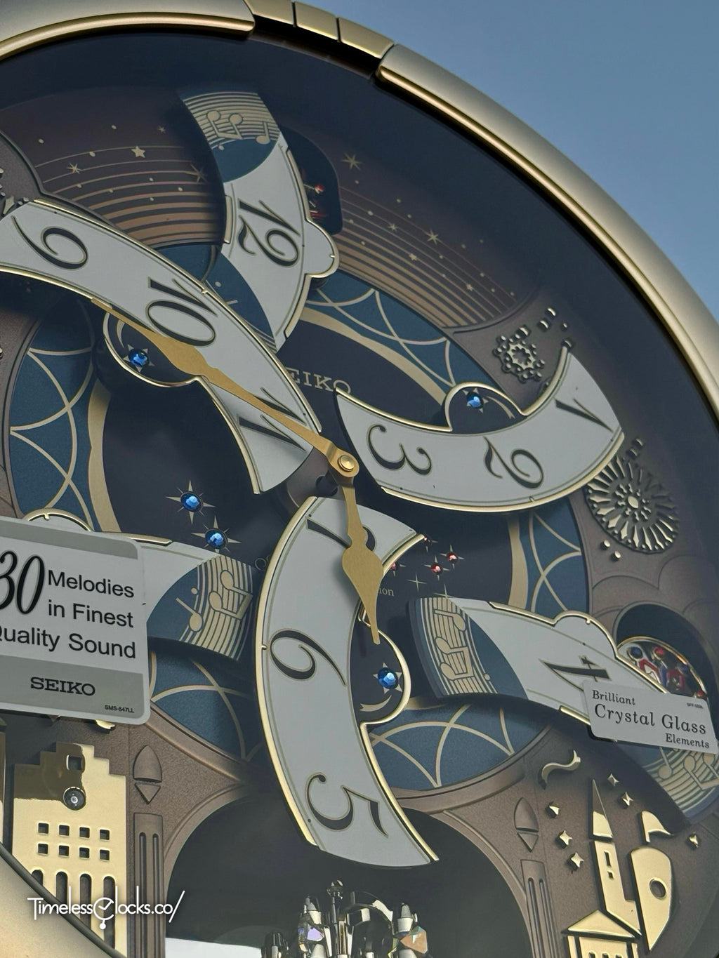 Seiko QXM620GRH "Golden Festival" Melodies in Motion Dancing Dial Musical Wall Clock with 30 Songs