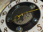 Seiko QXM160BRH “2008 Special Collector's Edition" Melodies in Motion Musical Moving Wall Clock with Music by The Beatles
