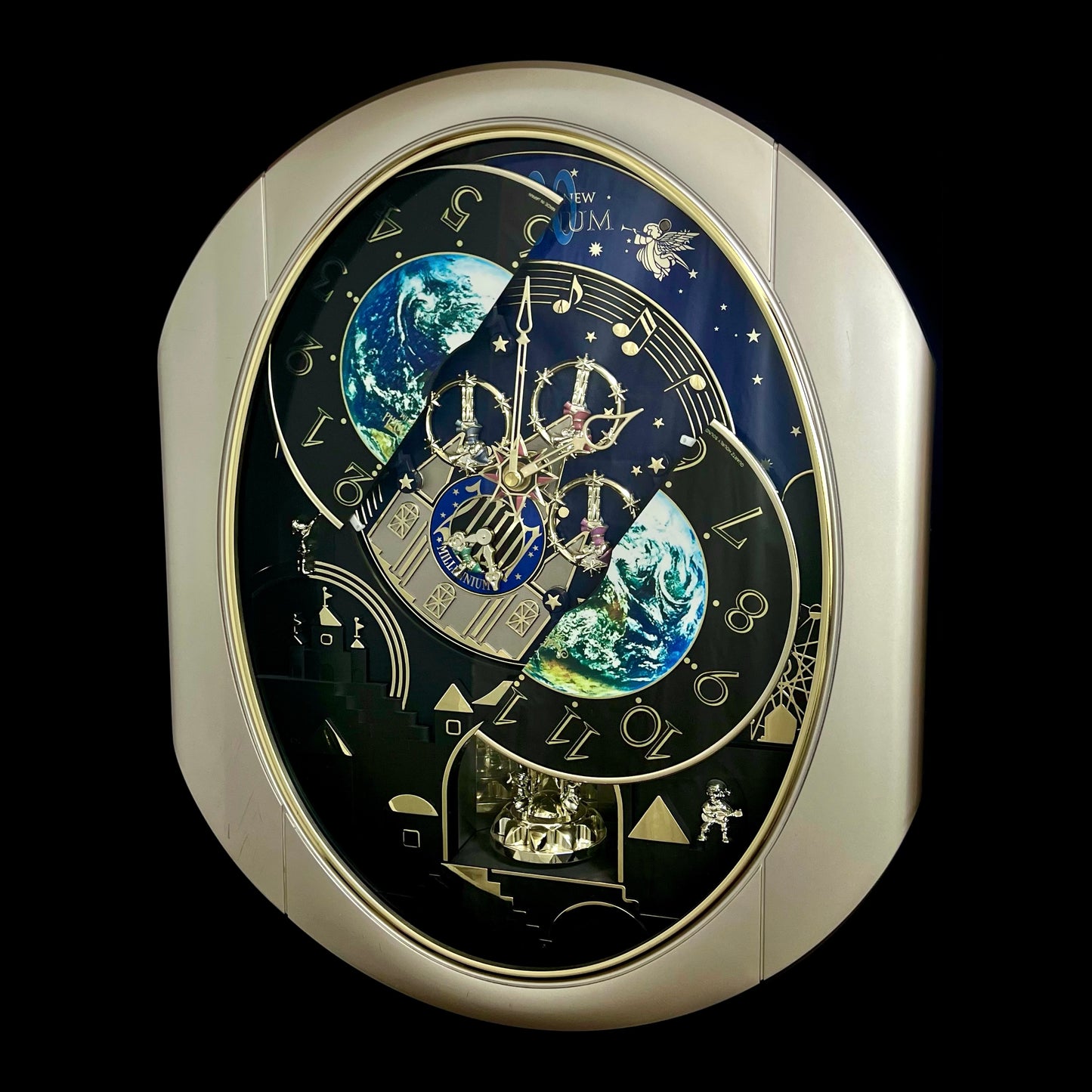 Rhythm “Timecracker 2000” Limited Edition Moving Earth Dial Magic Motion Musical Wall Clock with Popular Melodies - 4MH751NR19