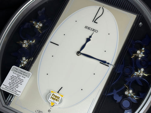 Seiko QXM158SRH "Sparkling Crystals" Melodies in Motion Musical Decorative Pendulum Wall Clock
