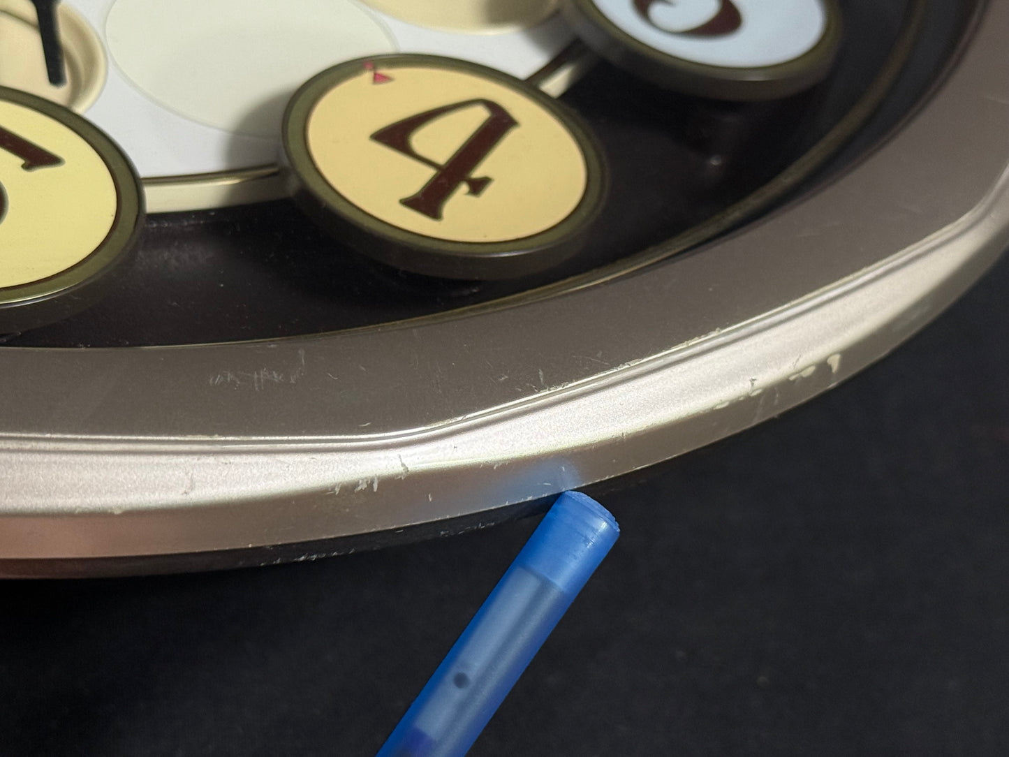 Seiko QXM106SRH "Twirling Numbers" Melodies in Motion Musical Wall Clock with Moving Dial