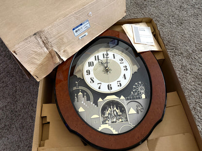 Rhythm “DWS Timecracker” Moving Dial Magic Motion Musical Wooden Wall Clock with Popular Melodies - 4MH752-R06