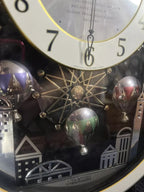 Rhythm "Magic Balloons" Magic Motion Musical Wall Clock with Animated Figurines - 4MH758-R08
