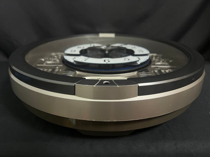 Seiko QXM366SRH “Musical Motifs” Melodies in Motion Dancing Dial Musical Wall Clock