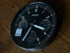 Seiko QXA823KLH "Shelby Watch Dial" Black Heritage Design Metal Wall Clock with Thermometer, Hygrometer, & Seconds Dial