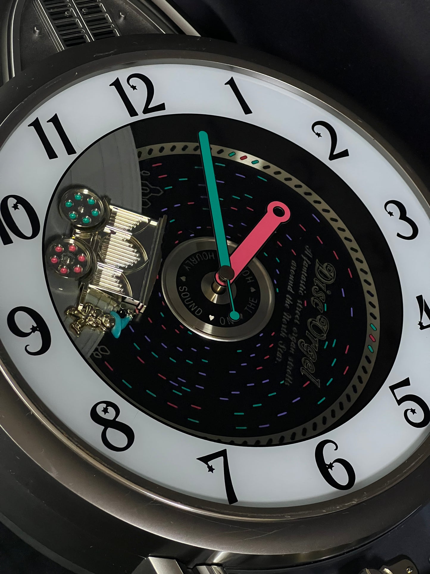 Rhythm "Calliope Phonograph" Magic Motion Musical Wall Clock with Moving Animation - 4MH714RH08