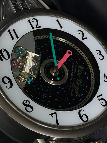 Rhythm "Calliope Phonograph" Magic Motion Musical Wall Clock with Moving Animation - 4MH714RH08