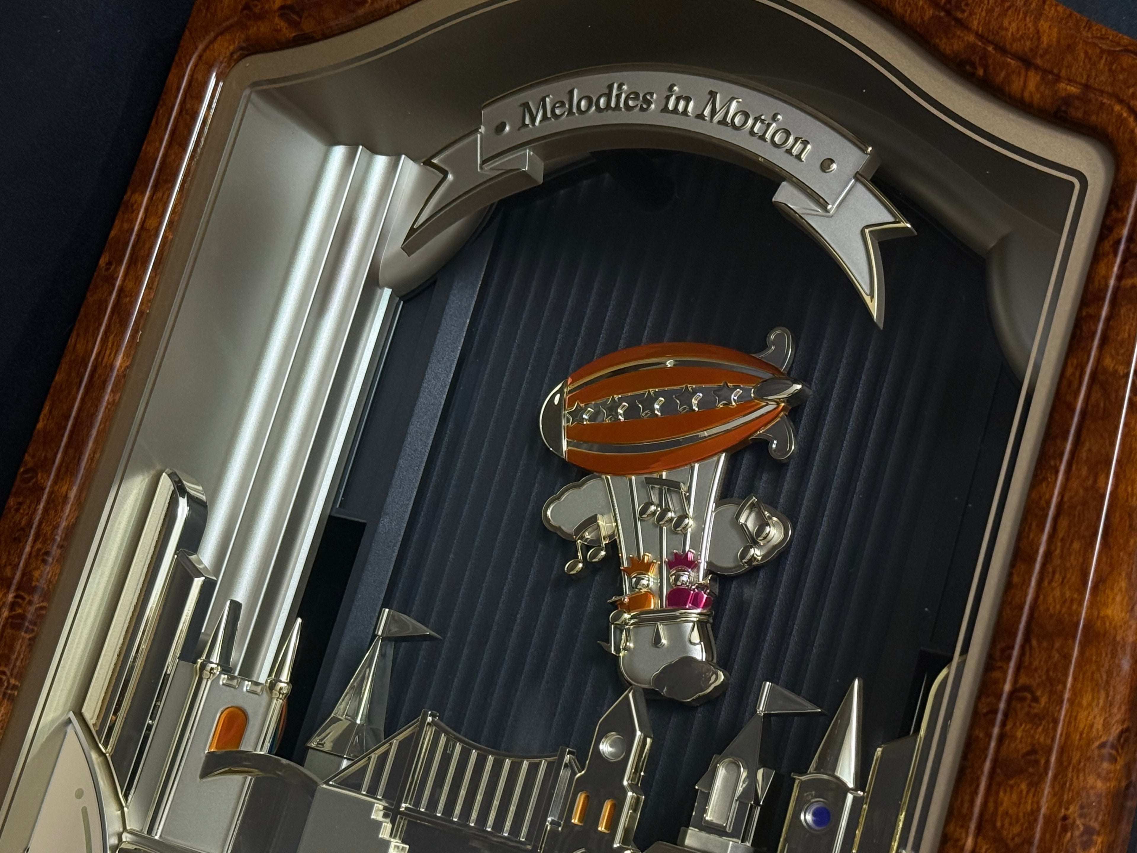 Seiko QXM135BRH "Lover’s Castle" Melodies in Motion Musical Moving Wall Clock with Popular Melodies