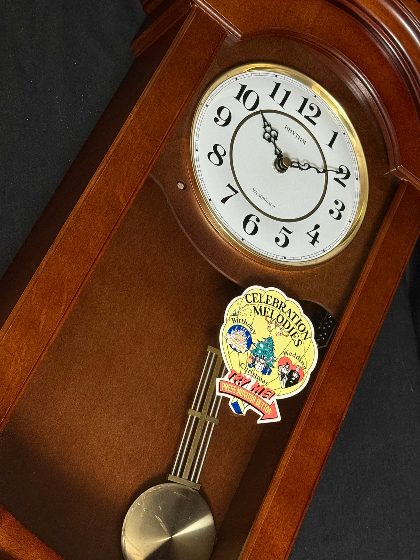Rhythm “Celebration Time 314” Traditional Wooden Musical & Chiming Pendulum Wall Clock - CMJ314-R06