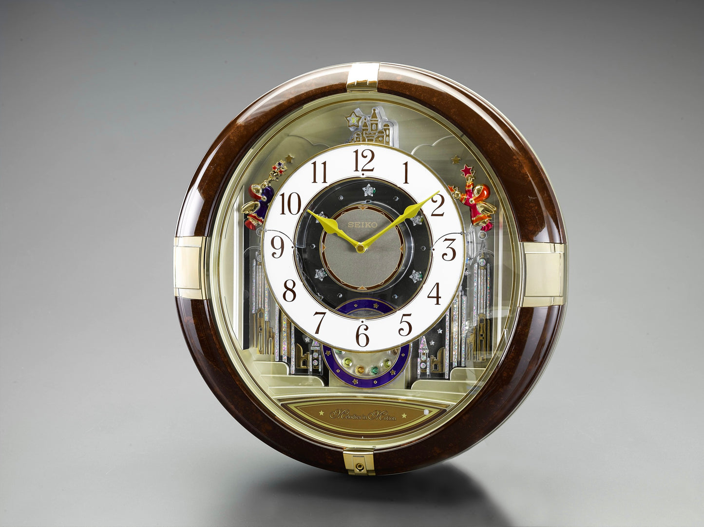 Seiko QXM333BRH "Trumpeting Angels" Melodies in Motion Jaw-Dropping Dial Musical Moving Wall Clock with 13 Songs