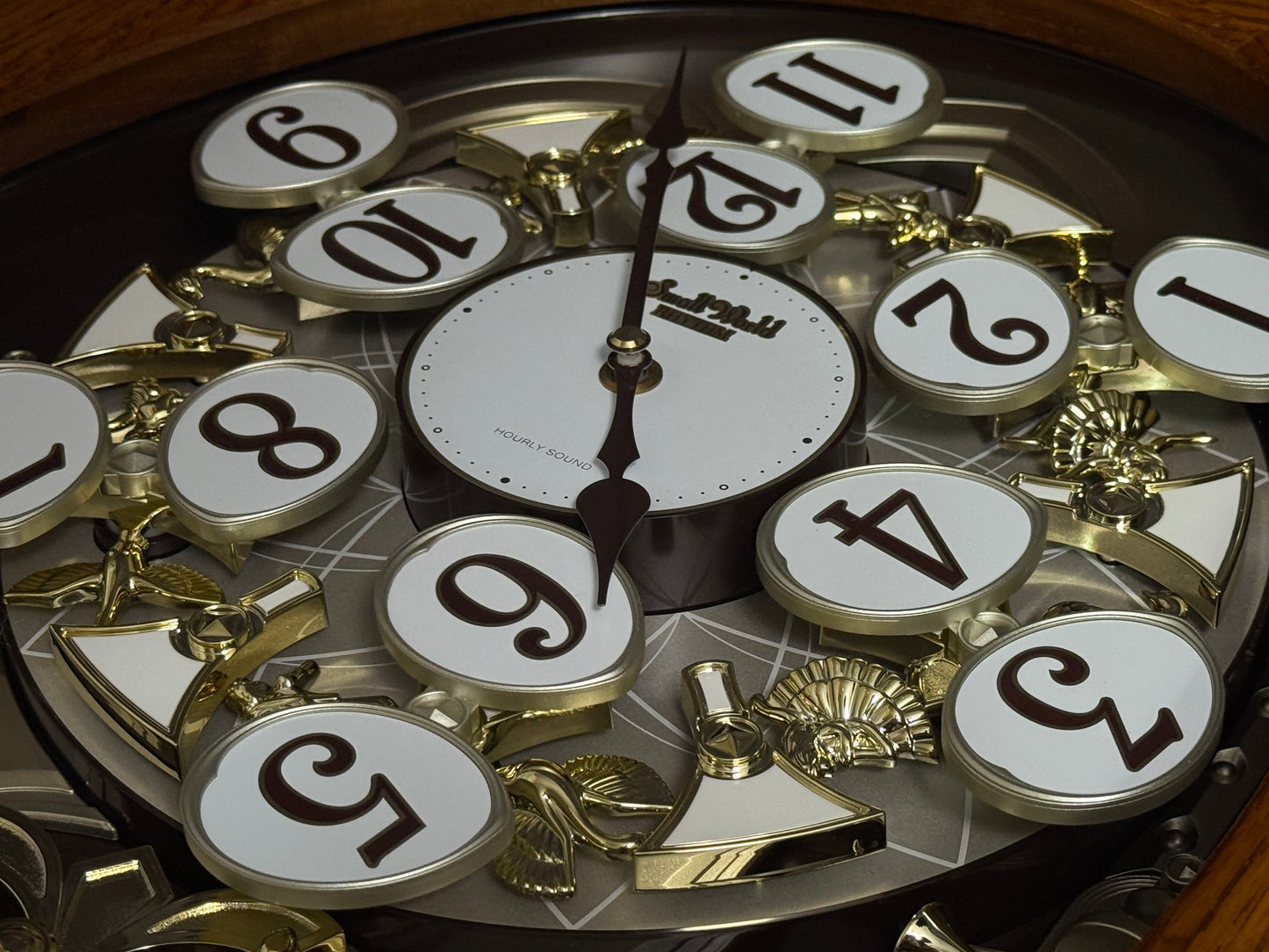 Rhythm "SSS Encore" Magic Motion Musical Wooden Wall Clock with Animated Moving Dial and Popular Melodies - 4MH810-R06