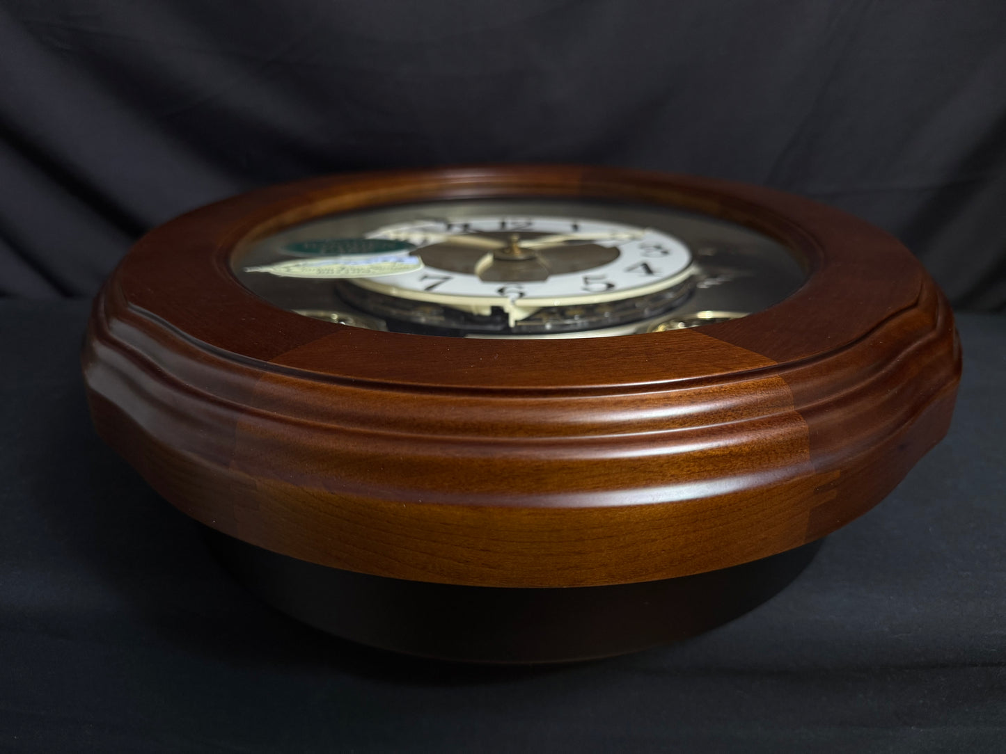 Rhythm "CTS Nostalgia" Moving Dial Magic Motion Musical Wooden Wall Clock with Popular Melodies - 4MH780-R06