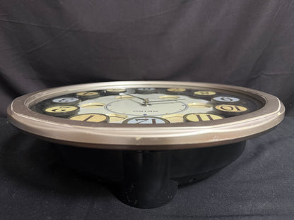 Seiko QXM106SRH "Twirling Numbers" Melodies in Motion Musical Wall Clock with Moving Dial