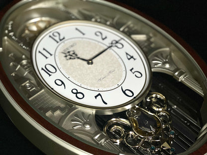 Seiko QXM369BRH “Golden Citadel” Melodies in Motion Musical Decorative Pendulum Wall Clock