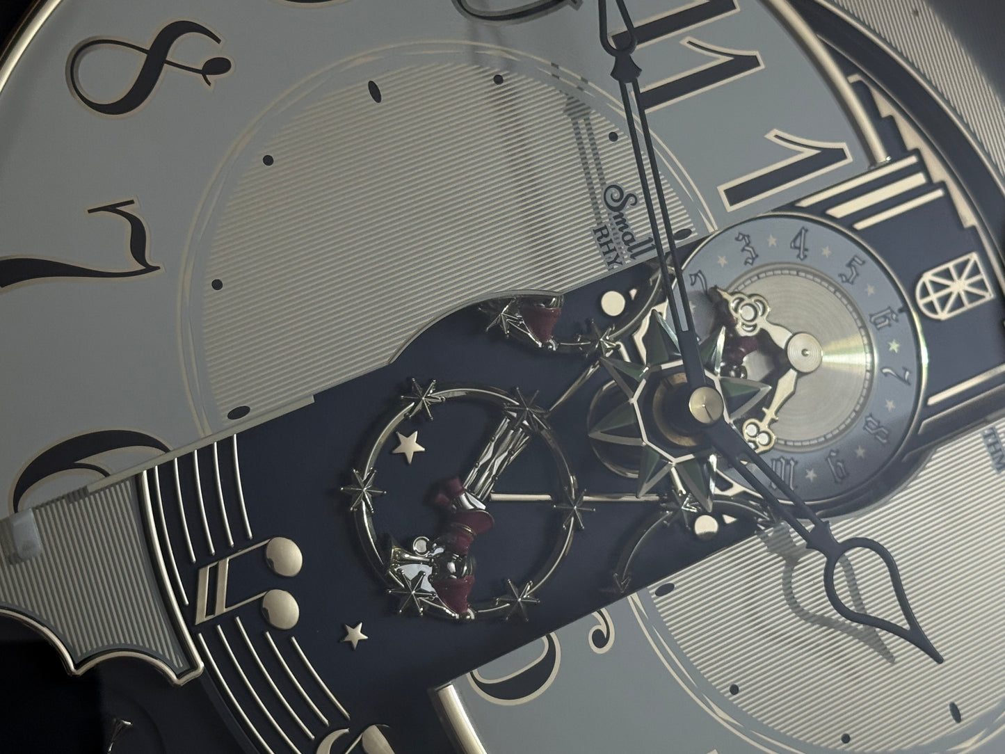 Rhythm "Timecracker Golden Oak" Moving Dial Magic Motion Musical Wooden Wall Clock with Popular Melodies - 4MH782-R07