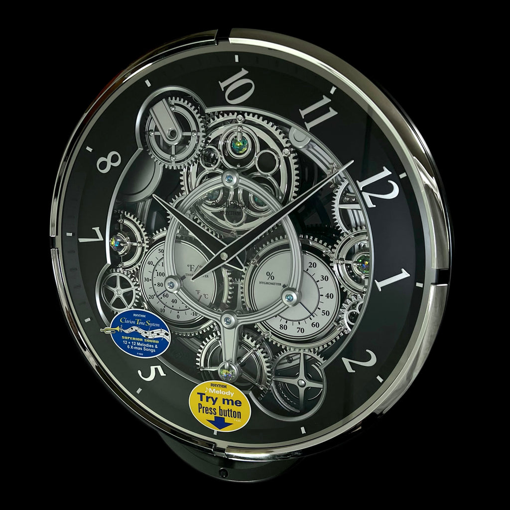 Rhythm “Chronograph (Black/Silver)” Skeletonized Dial Magic Motion Musical Wall Clock with Moving Gears - 4MH442WU08