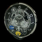 Rhythm “Chronograph (Black/Silver)” Skeletonized Dial Magic Motion Musical Wall Clock with Moving Gears - 4MH442WU08
