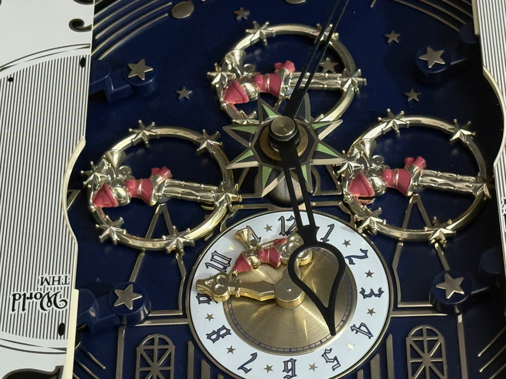 Rhythm "Timecracker Golden Oak" Moving Dial Magic Motion Musical Wooden Wall Clock with Popular Melodies - 4MH782-R07