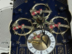 Rhythm "Timecracker Golden Oak" Moving Dial Magic Motion Musical Wooden Wall Clock with Popular Melodies - 4MH782-R07