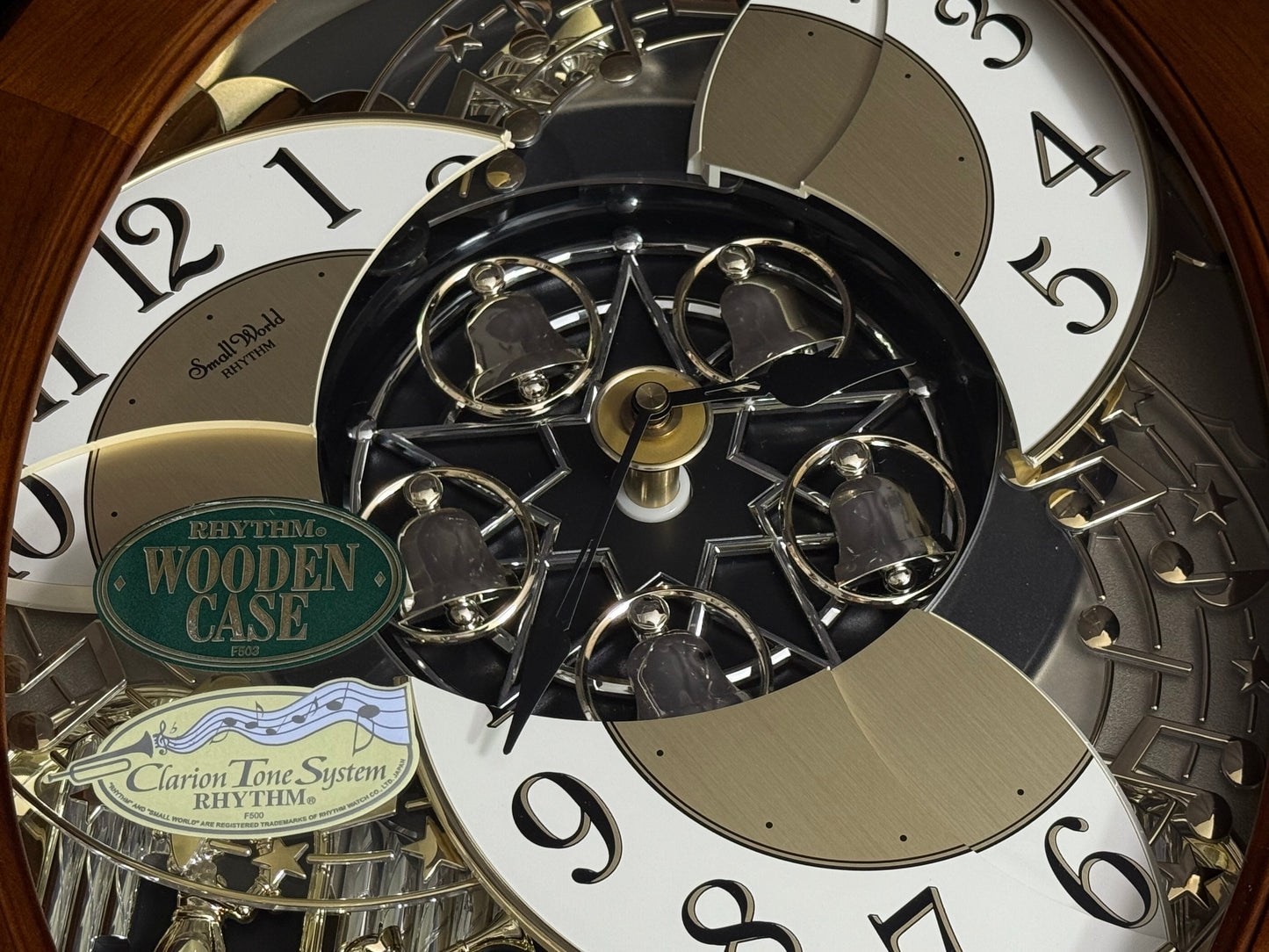 Rhythm "CTS Nostalgia" Moving Dial Magic Motion Musical Wooden Wall Clock with Popular Melodies - 4MH780-R06