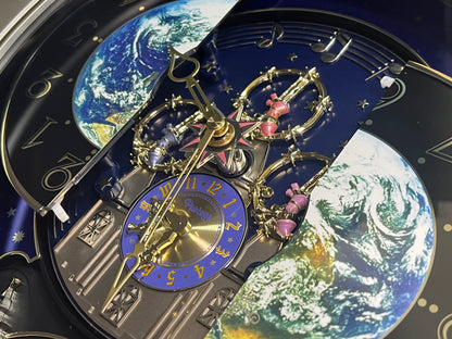 Rhythm “Peaceful Cosmos” Moving Earth Dial Magic Motion Musical Wall Clock with Popular Melodies - 4MH751AR19