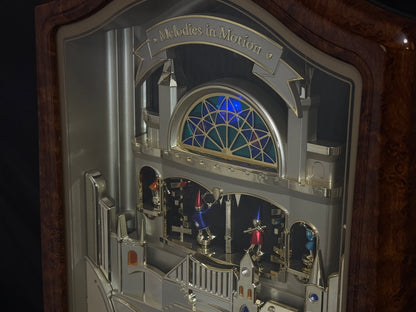 Seiko QXM135BRH "Lover’s Castle" Melodies in Motion Musical Moving Wall Clock with Popular Melodies