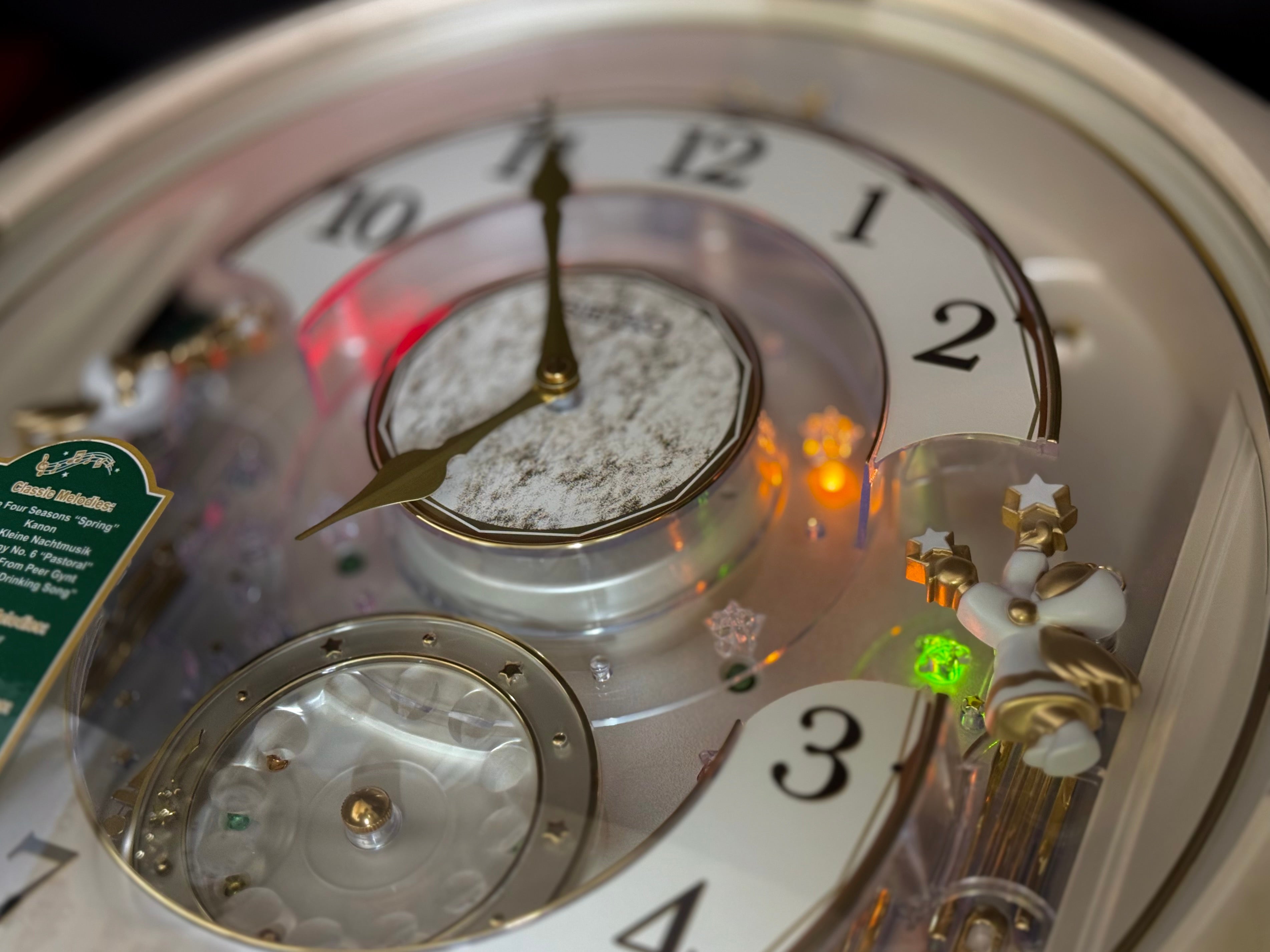 Seiko QXM603WRH “Winter Angels” Melodies in Motion Jaw-Dropping