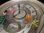 Seiko QXM603WRH “Winter Angels” Melodies in Motion Jaw-Dropping Dial Musical Moving Wall Clock with 13 Songs