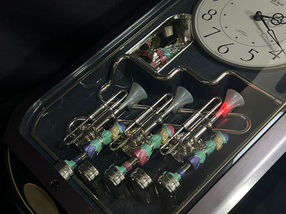 Rhythm "Trumpet Trio" Magic Motion Musical Wall Clock with Animated Figurines - 4MH712-R02