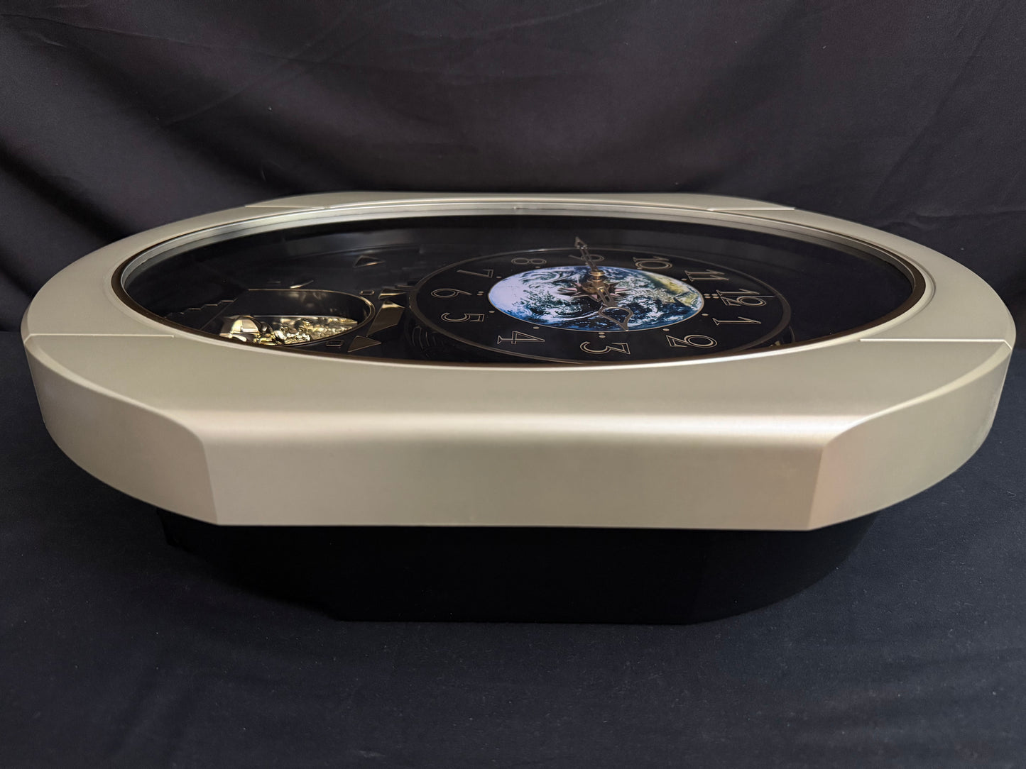 Rhythm “Peaceful Cosmos Entertainer” Moving Earth Dial Magic Motion Musical Wall Clock with Popular Melodies - 4MH839WB19