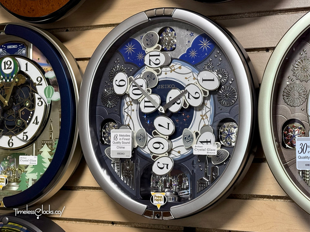 Seiko QXM379SRH “Glittering Starry Night” Melodies in Motion Dancing Dial Musical Wall Clock with 19 Songs