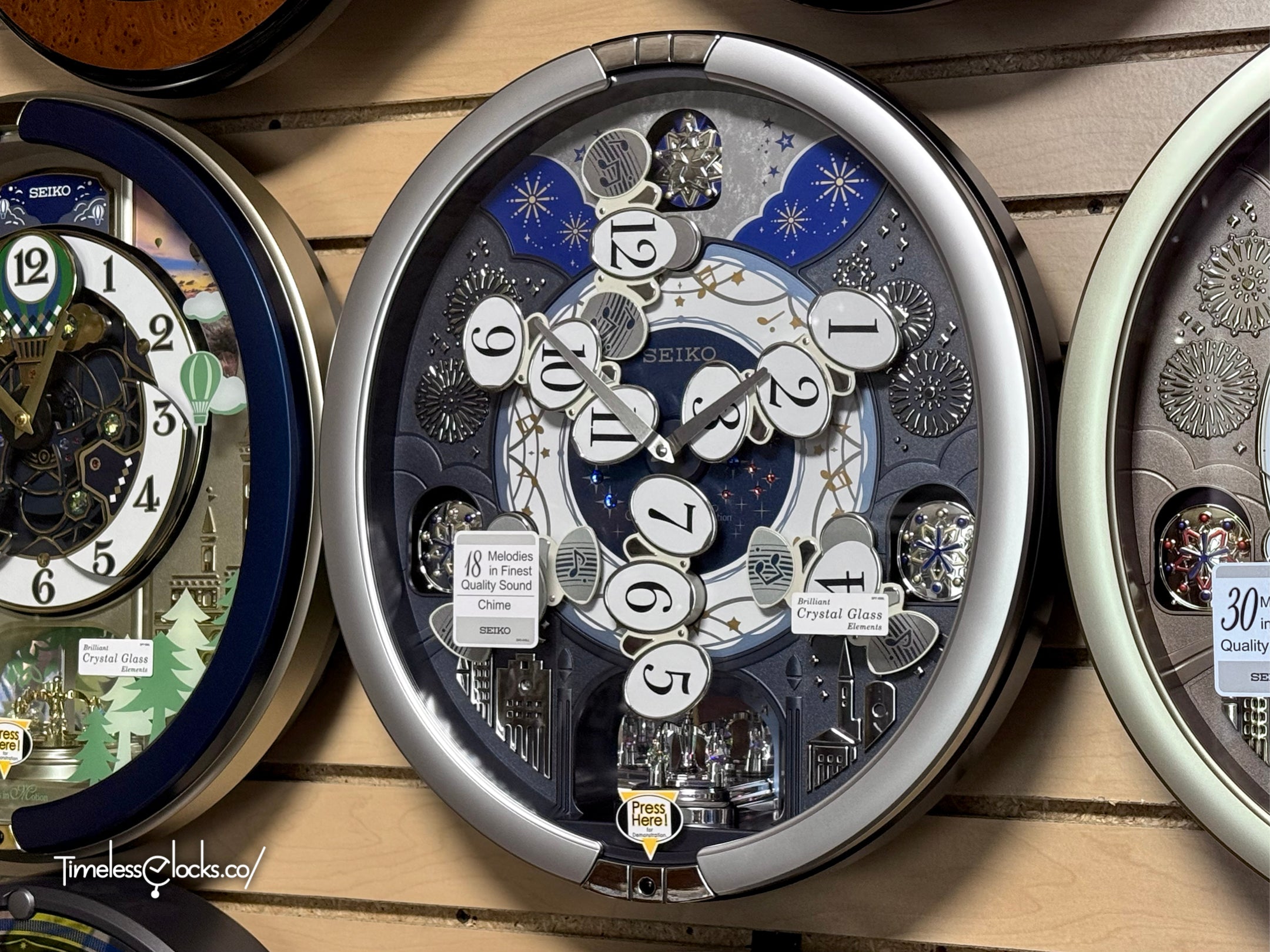 Seiko QXM379SRH “Glittering Starry Night” Melodies in Motion Dancing Dial Musical Wall Clock with 19 Songs