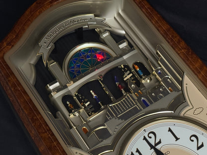 Seiko QXM135BRH "Lover’s Castle" Melodies in Motion Musical Moving Wall Clock with Popular Melodies