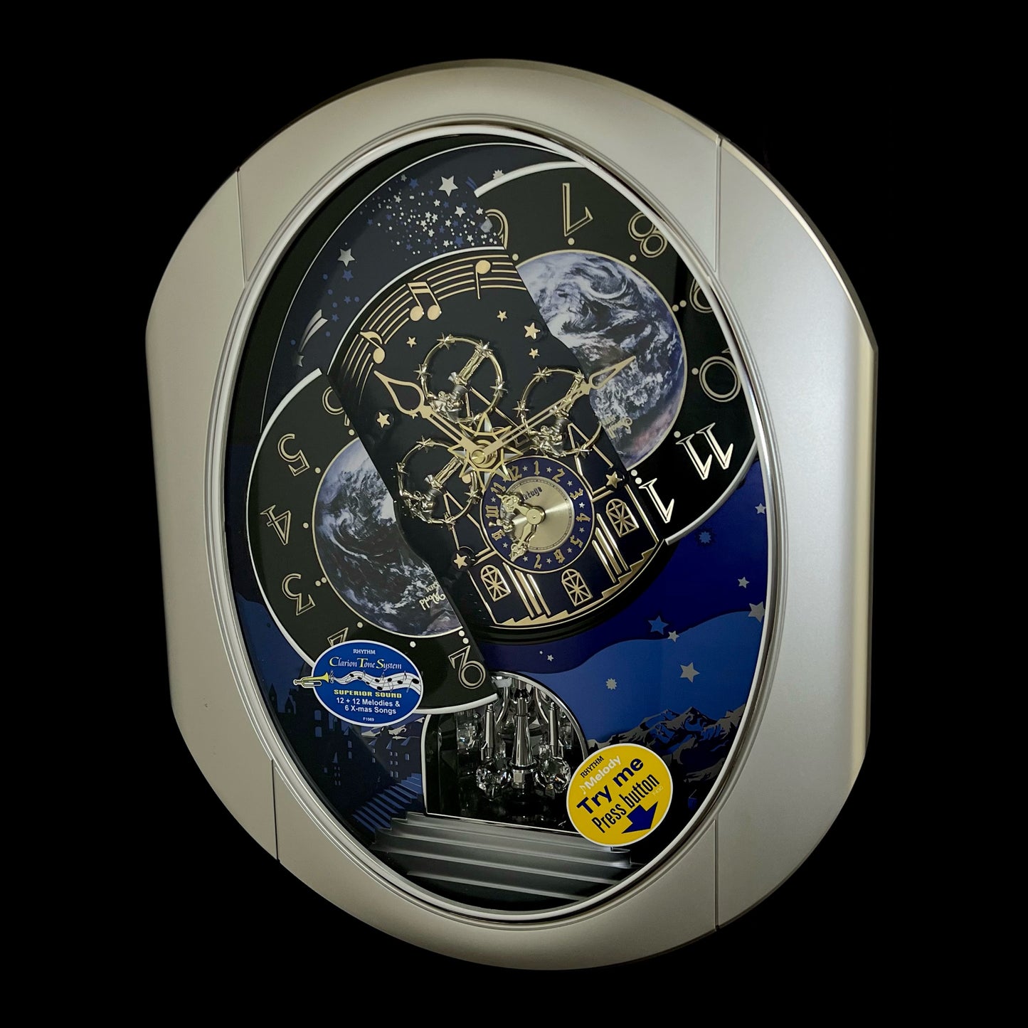 Rhythm “Peaceful Cosmos II” Moving Earth Dial Magic Motion Musical Wall Clock - 4MH408WU19