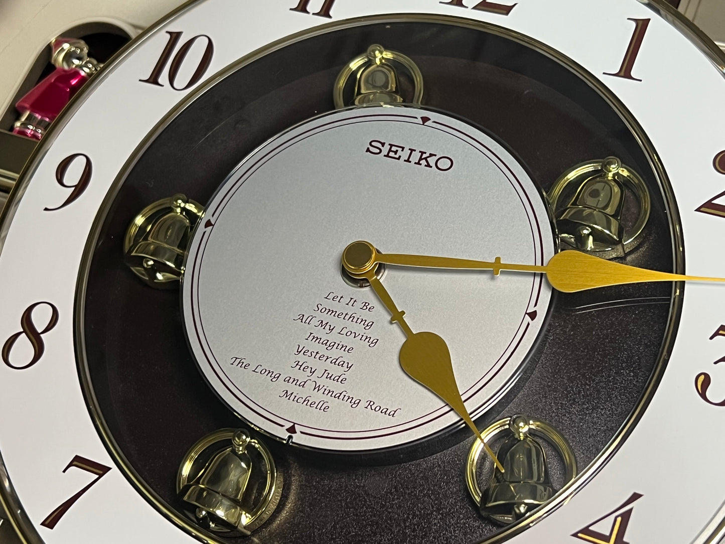 Seiko QXM134BRH "2005 Special Collector's Edition" Melodies in Motion Musical Moving Wall Clock with Music by The Beatles